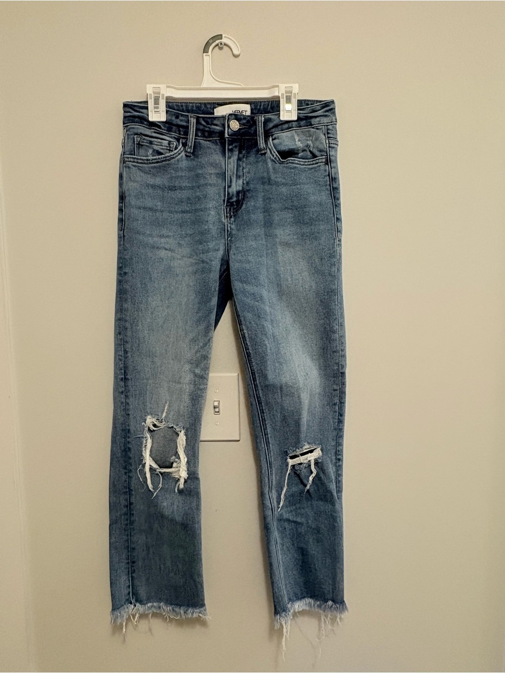 Mid Blue Distressed Ankle Jeans with Raw Hem